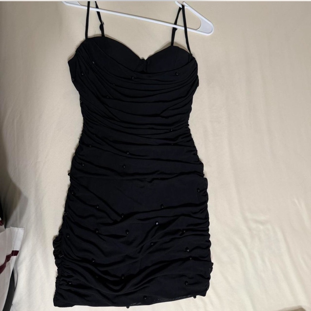 Women’s black pearl detailing mini dress